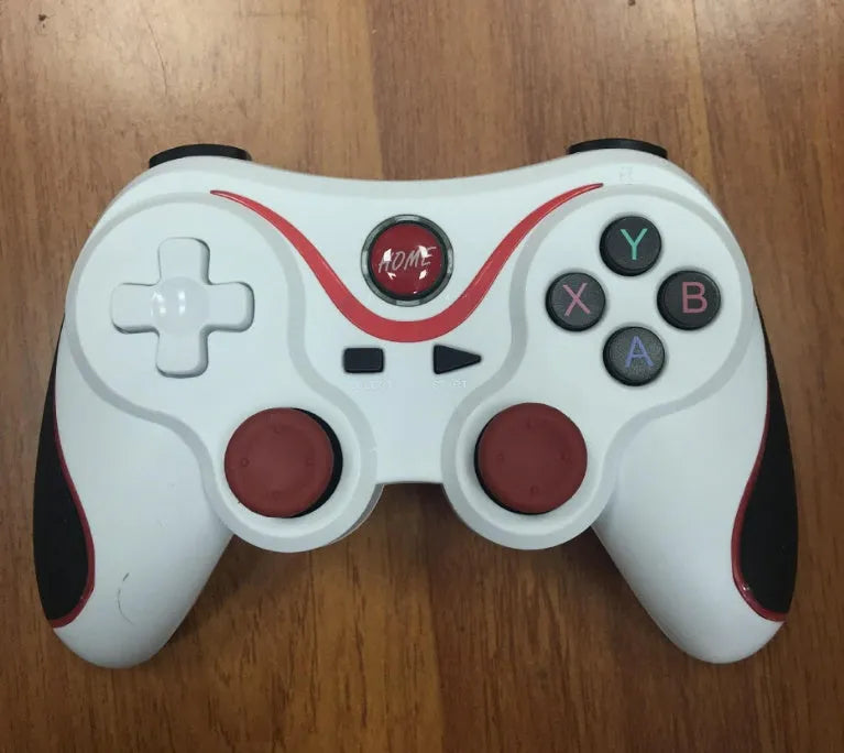 X3 Bluetooth wireless game controller for Android phones with mobile phone clip attached