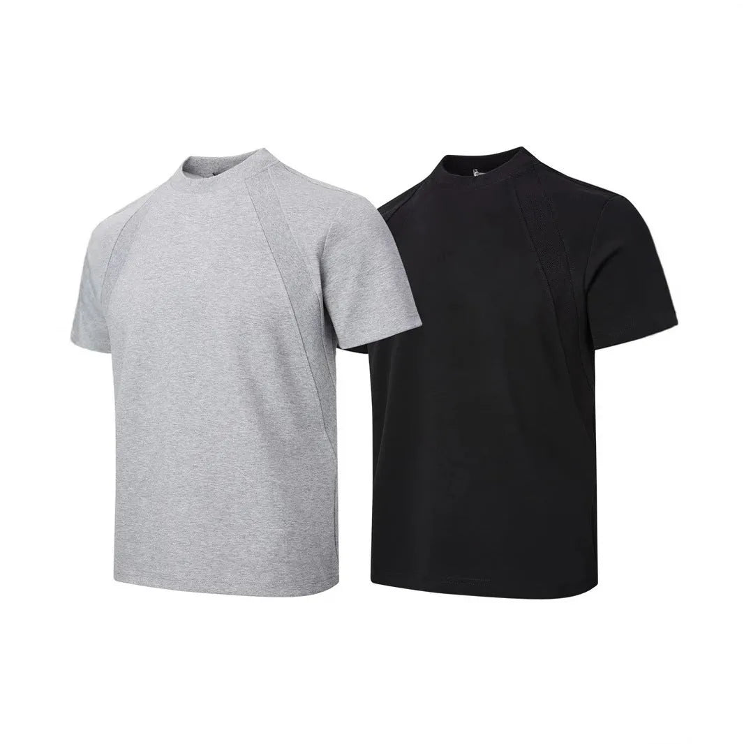 Men's black short sleeve top with air layer stitching detail, loose fit design