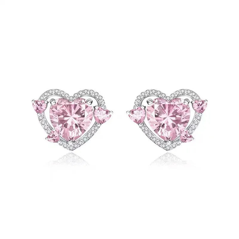 Women's electroplated copper heart stud earrings with white K colour finish and butterfly clutch fastenings