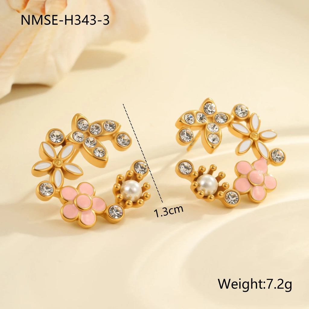 Flower-shaped stud earrings with colourful oil accents and petal elements on 18K gold electroplated stainless steel