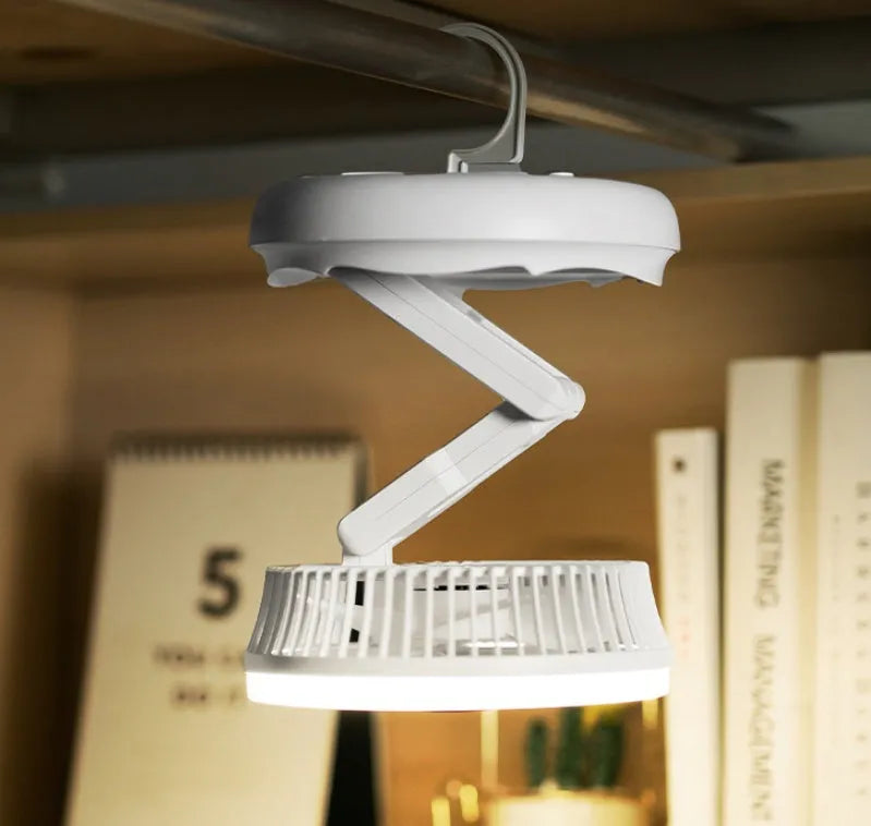 Blue foldable USB desk fan with LED light shown in wall-mounted and desk positions