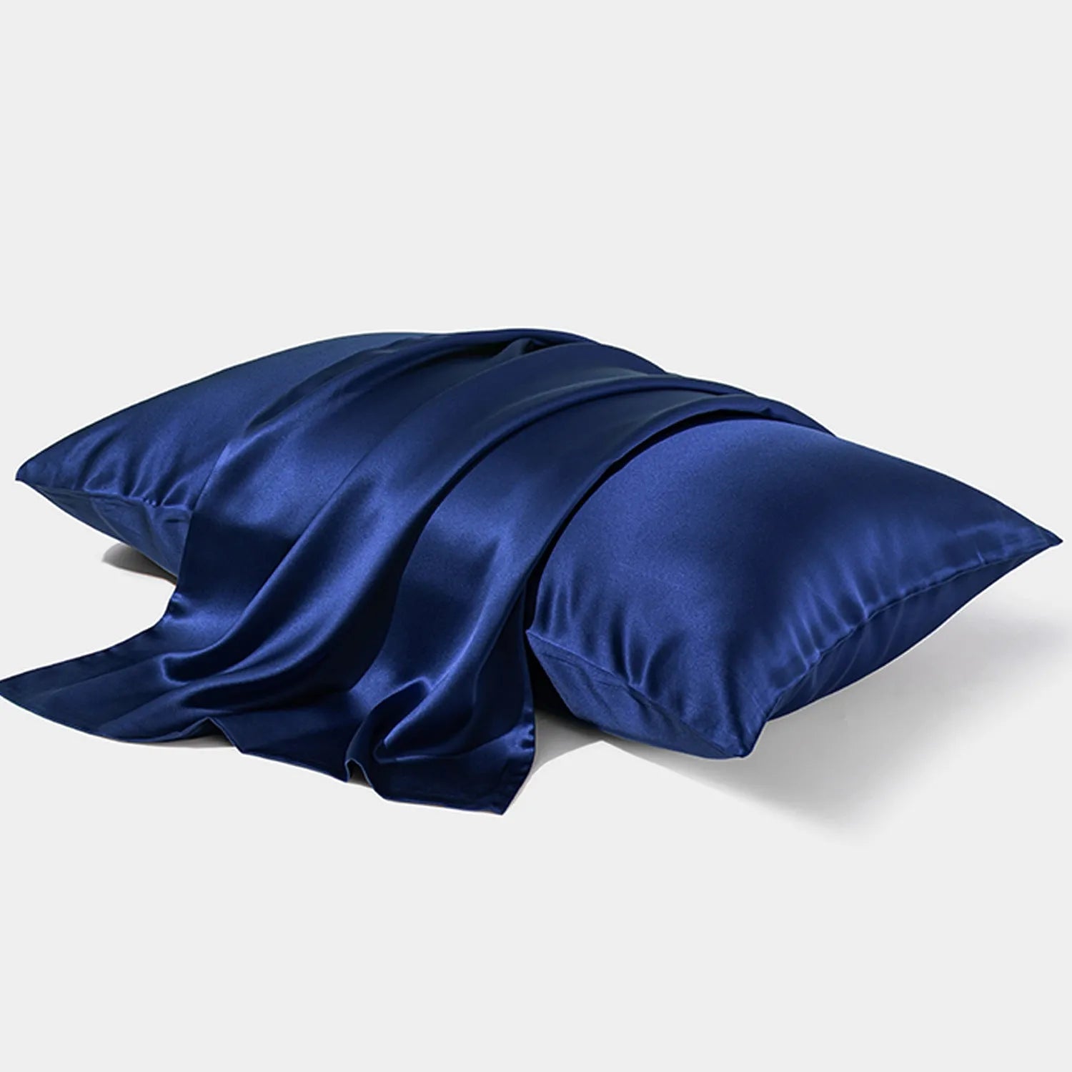 Dark grey 19 momme mulberry silk pillowcase with an envelope closure, laid flat.