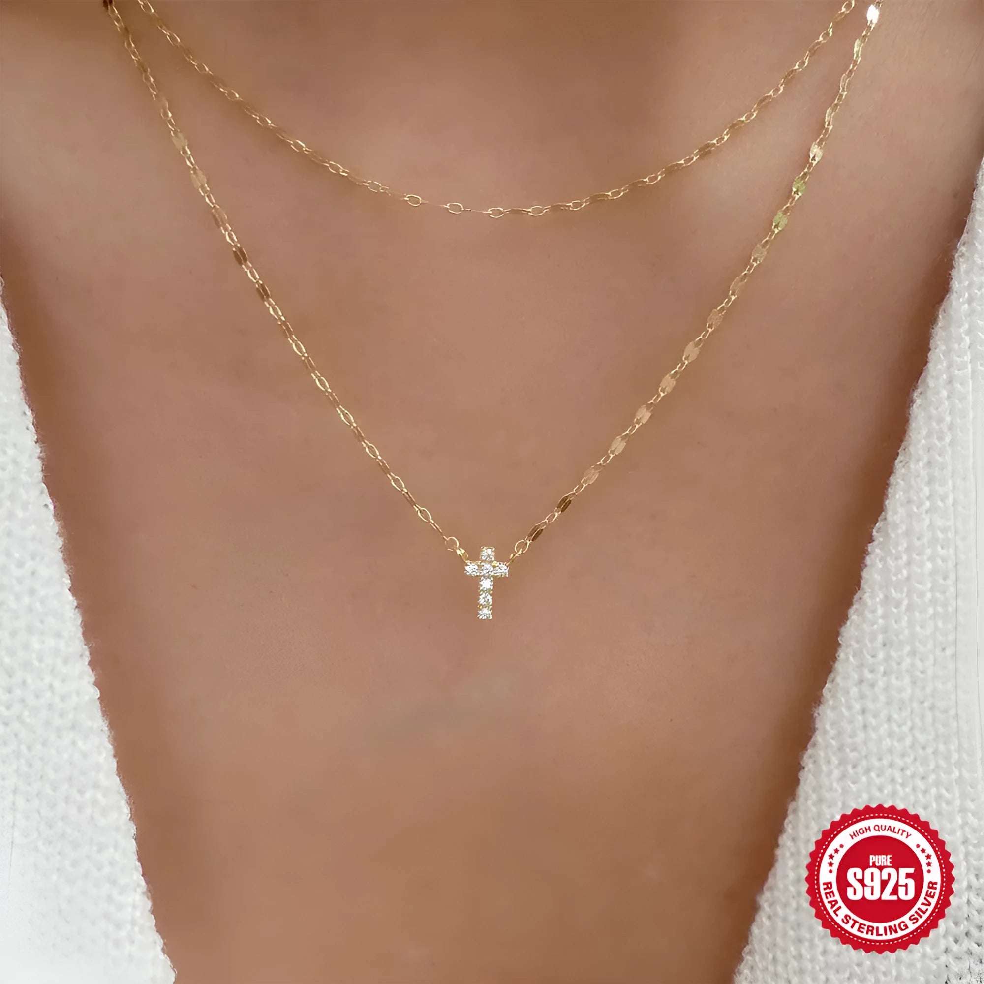 S925 sterling silver double layer cross pendant necklace with diamond accents on a clavicle chain.