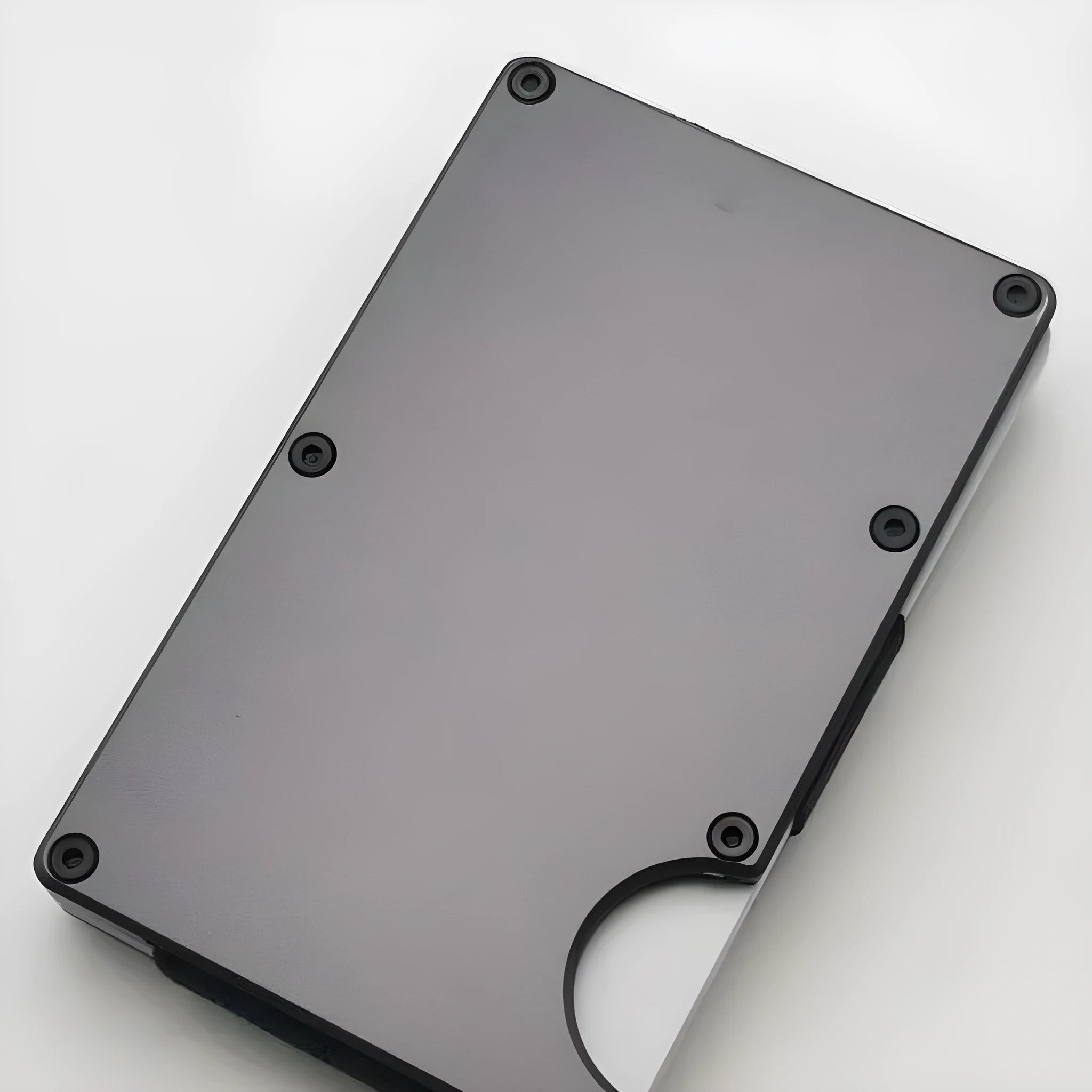 Carbon fibre credit card wallet in aluminium alloy grey colour showing card slots