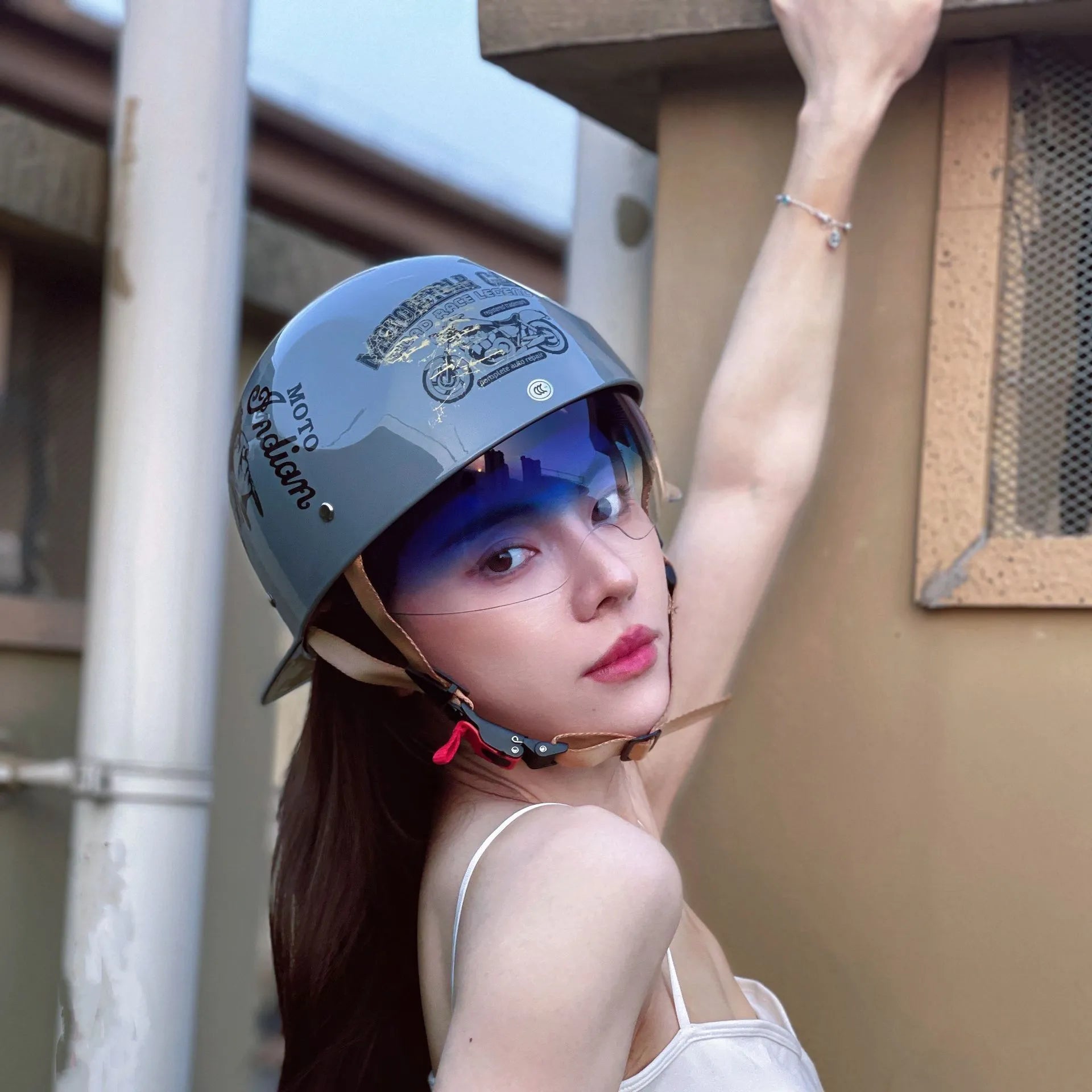 Retro-style electric bicycle half helmet for men in bright black with a gradient blue lens.