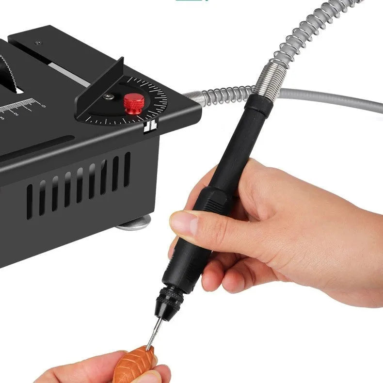 Lithium ion battery desktop saw with five attachments on workbench