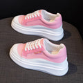 Women's beige and pink thick-soled leather board shoes on a white background.