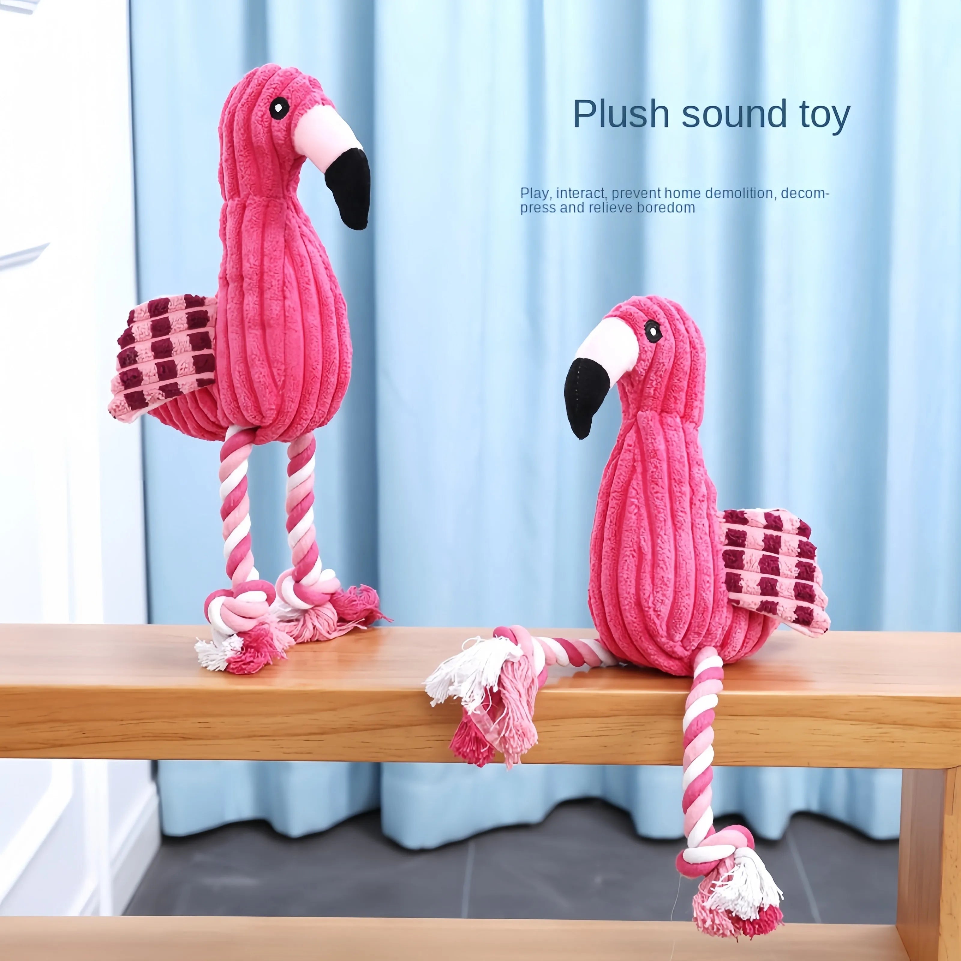 Pink corduroy animal-shaped squeaky plush dog toy on a plain background