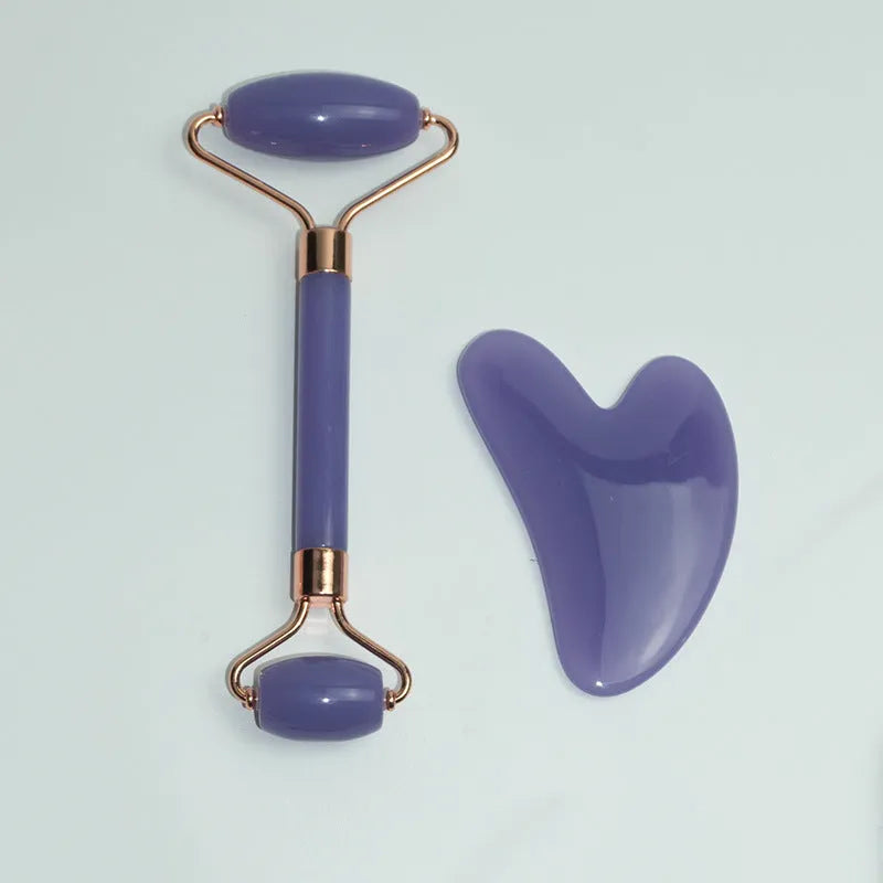 Stainless steel facial massage board set with heart-shaped eye tool and double-head roller