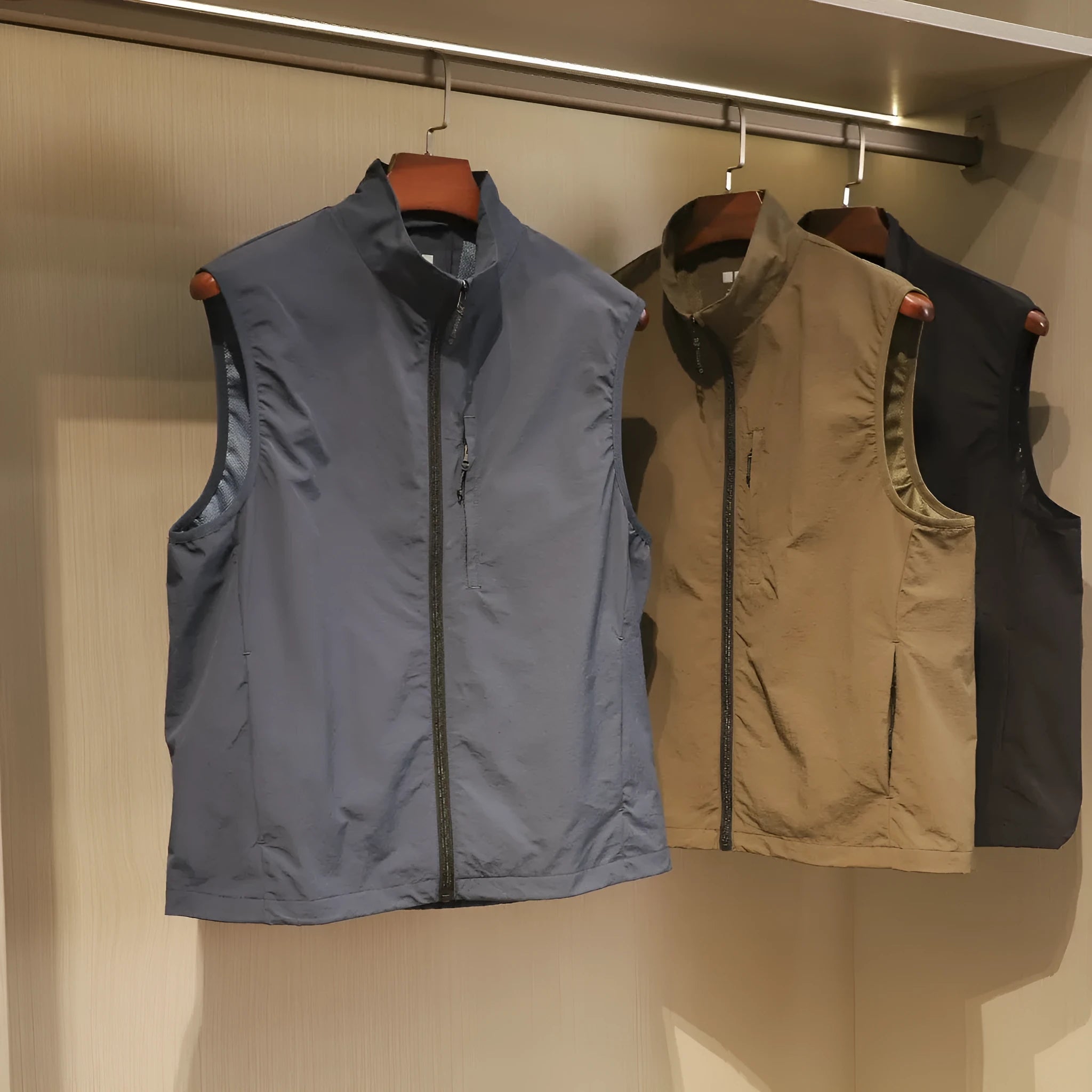 Men's thin nylon vest cardigan in army green with side pockets and straight retro cut.