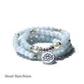 Women's vintage-style bracelet with a natural stone angel echeveria lotus pendant on a chain.
