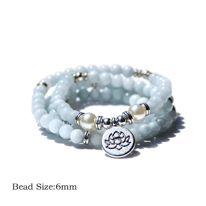 Women's vintage-style bracelet with a natural stone angel echeveria lotus pendant on a chain.
