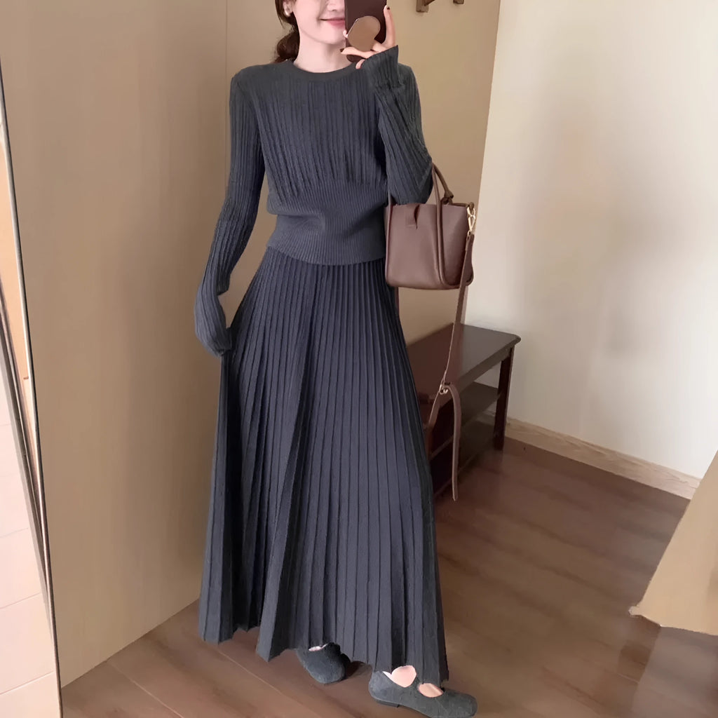 Women's dark grey knitted two-piece suit with artistic collage stitching and retro ethnic style.