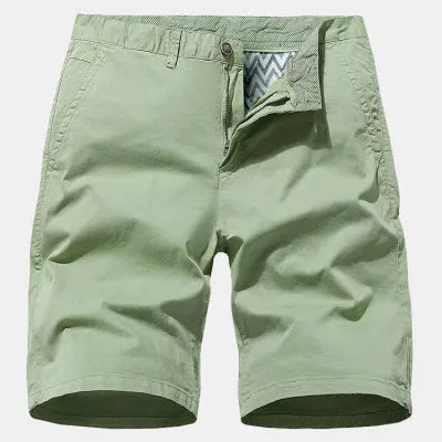 Blue denim men's shorts with printed design, loose fit, and no belt on a mannequin.