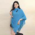 Women's triangle shawl cape in plush cashmere-acrylic blend with tassel detailing