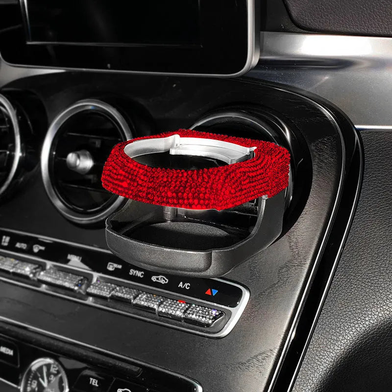 Rhinestone-decorated car cup holder bracket mounted on vehicle air vent in multiple colour options