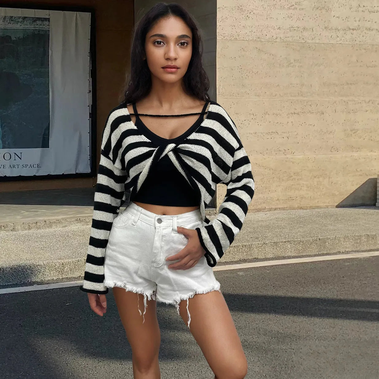 Striped long-sleeved cotton sweater with front and back wearable design and exposed navel detail