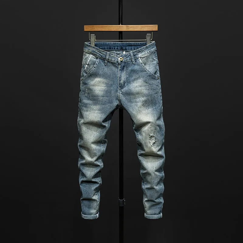 Men's skinny fit jeans in dark blue cotton denim with micro elasticity and mid-waist design