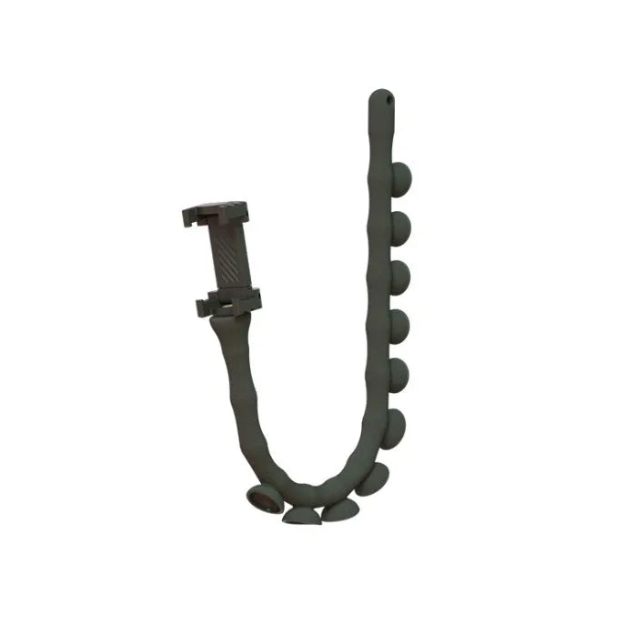 Flexible rubber phone holder with suction cup mounted on desktop showing 360-degree rotation