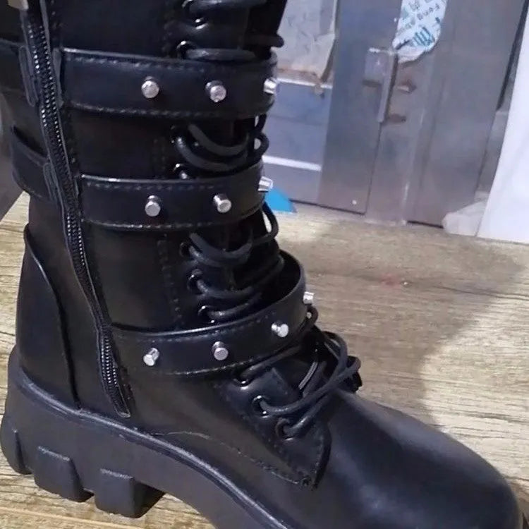 Black mid-calf women's knight boots with metal buckle and side zipper on a white background.