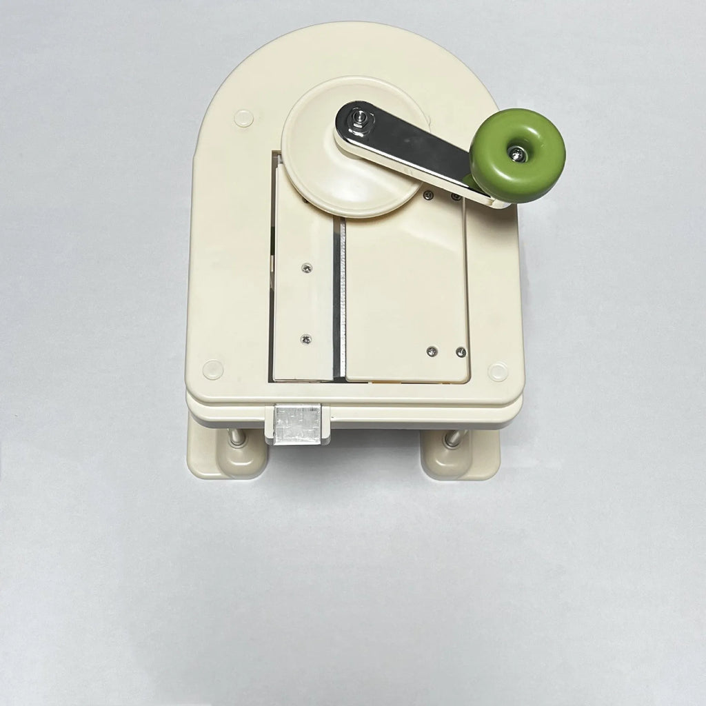 Beige stainless steel vegetable slicer chopper with multifunctional blades for kitchen use
