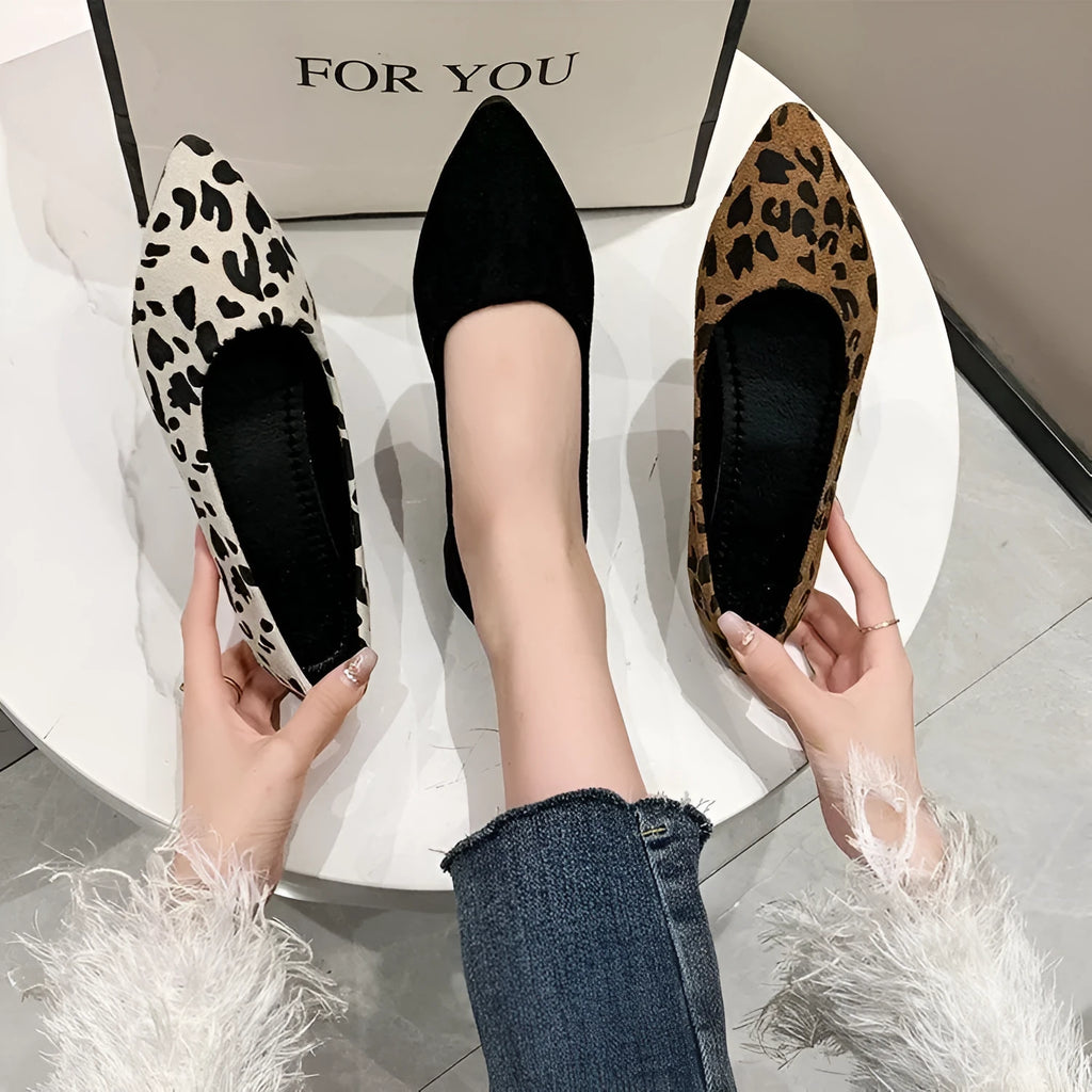 Women's leopard print flat pumps with pointed toe and low heel on rubber sole