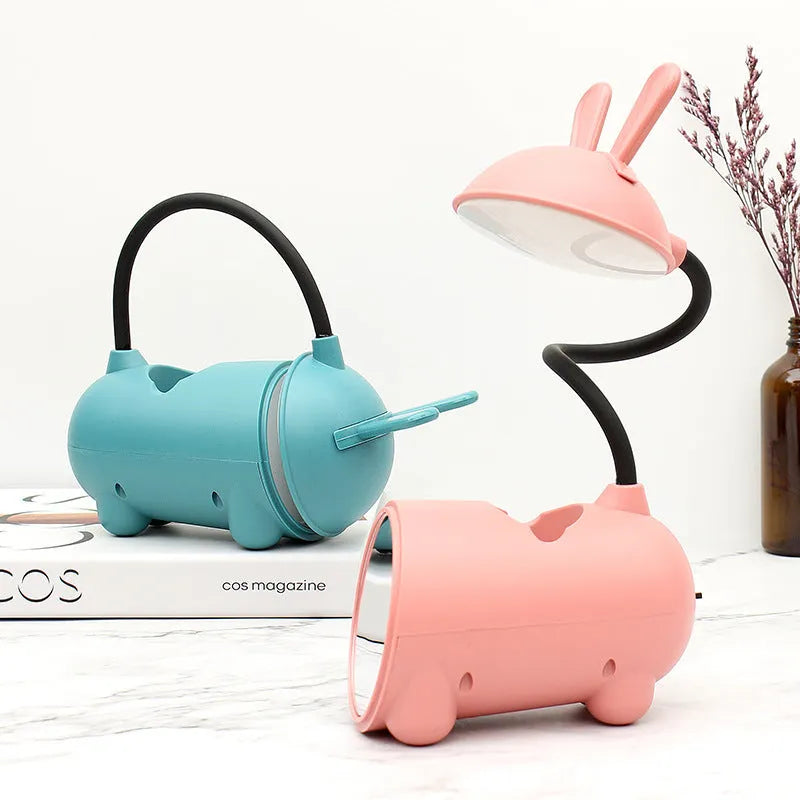 Cartoon-style USB desktop lamp with pen container in green, dark blue, or pink colour