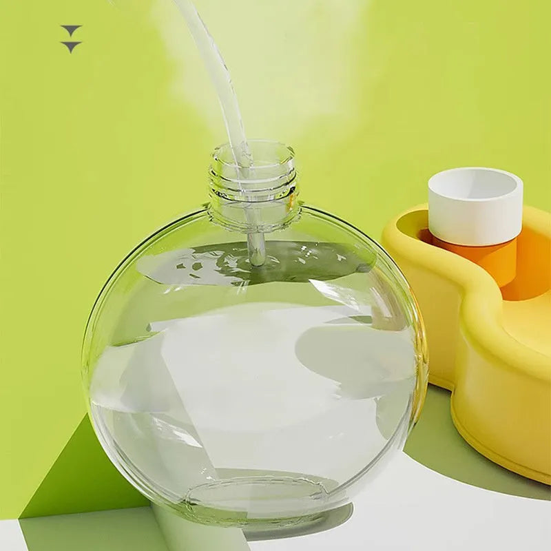 Green Orange Yellow portable pet travel cup with integrated drinking bowl and handle, showing 500ml and 350ml size options.