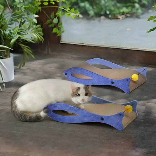 Blue fish-shaped cardboard cat scratcher lounger with a red bell ball toy on an elastic cord.