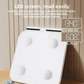 Professional white body fat scale with eight electrodes and tempered glass platform measuring 30x30cm
