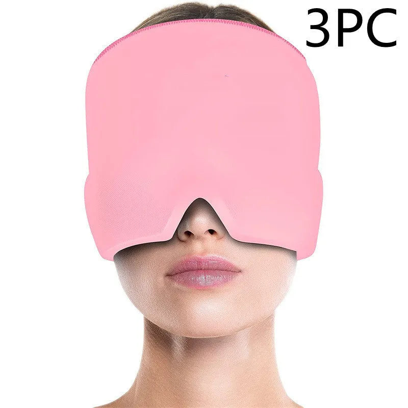 Black elastic cloth gel cold therapy eye mask for headache relief on grey background.