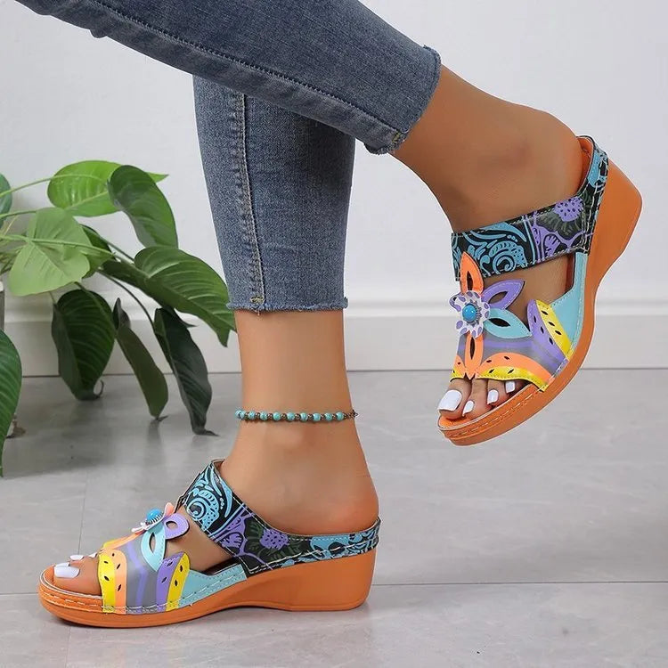 Ethnic Cool Girl coloured slope and totem design sandals with cowhide upper and rubber sole.