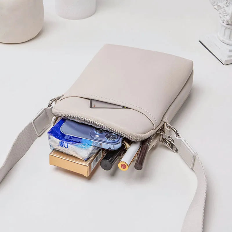 Solid colour women's crossbody phone bag in black, beige, khaki, or green.