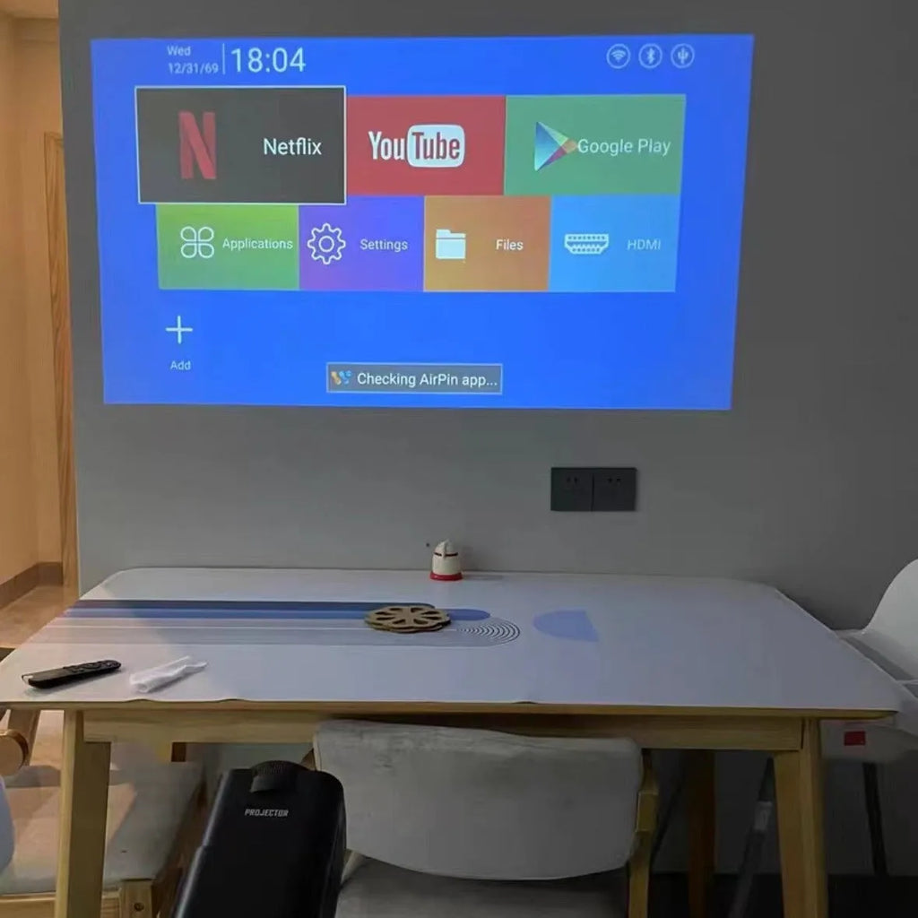 Wireless HD home projector with 720p resolution for gaming and movie viewing