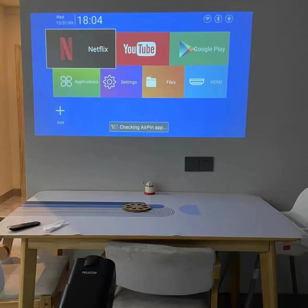 Wireless HD home projector with 720p resolution for gaming and movie viewing