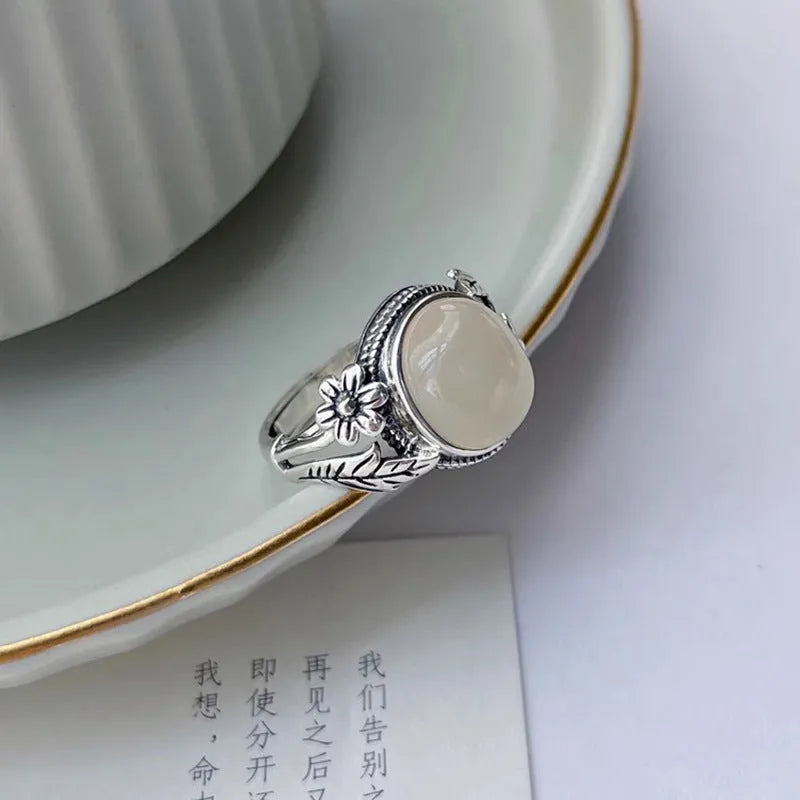 Adjustable copper vintage ring with white chalcedony style colour and U-shaped open mouth design