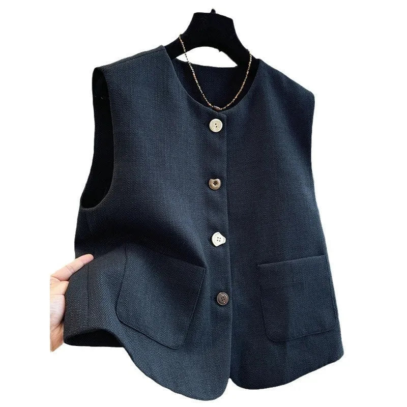 Women's milky white French-style bandage vest with round neck and sleeveless design on a hanger.
