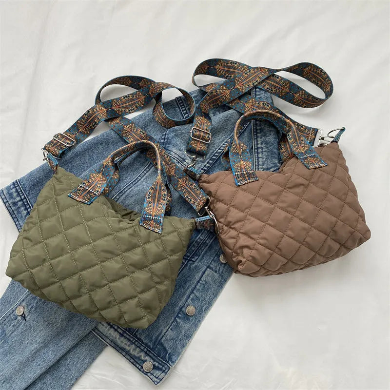 Soft Oxford cloth messenger bag with embroidery details and internal phone pocket in horizontal square shape