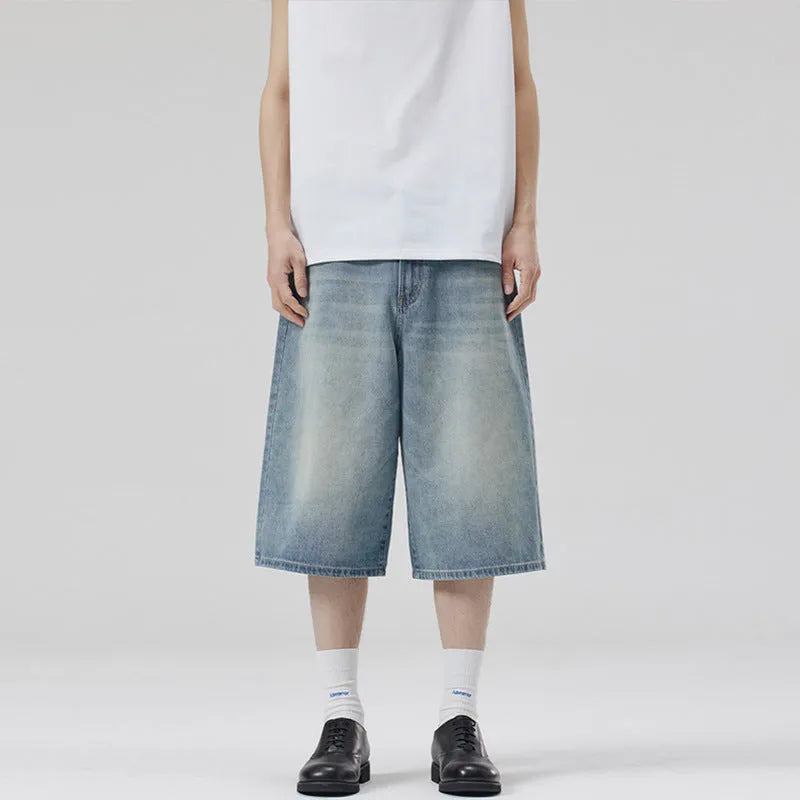 Men's light blue denim shorts with a straight leg and cropped length on a mannequin.