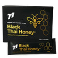 Bottle of T1 Black Thai Honey, a black-coloured honey product.