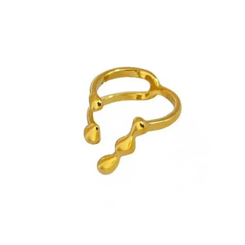 Brass opening ring with spherical design elements in gold finish