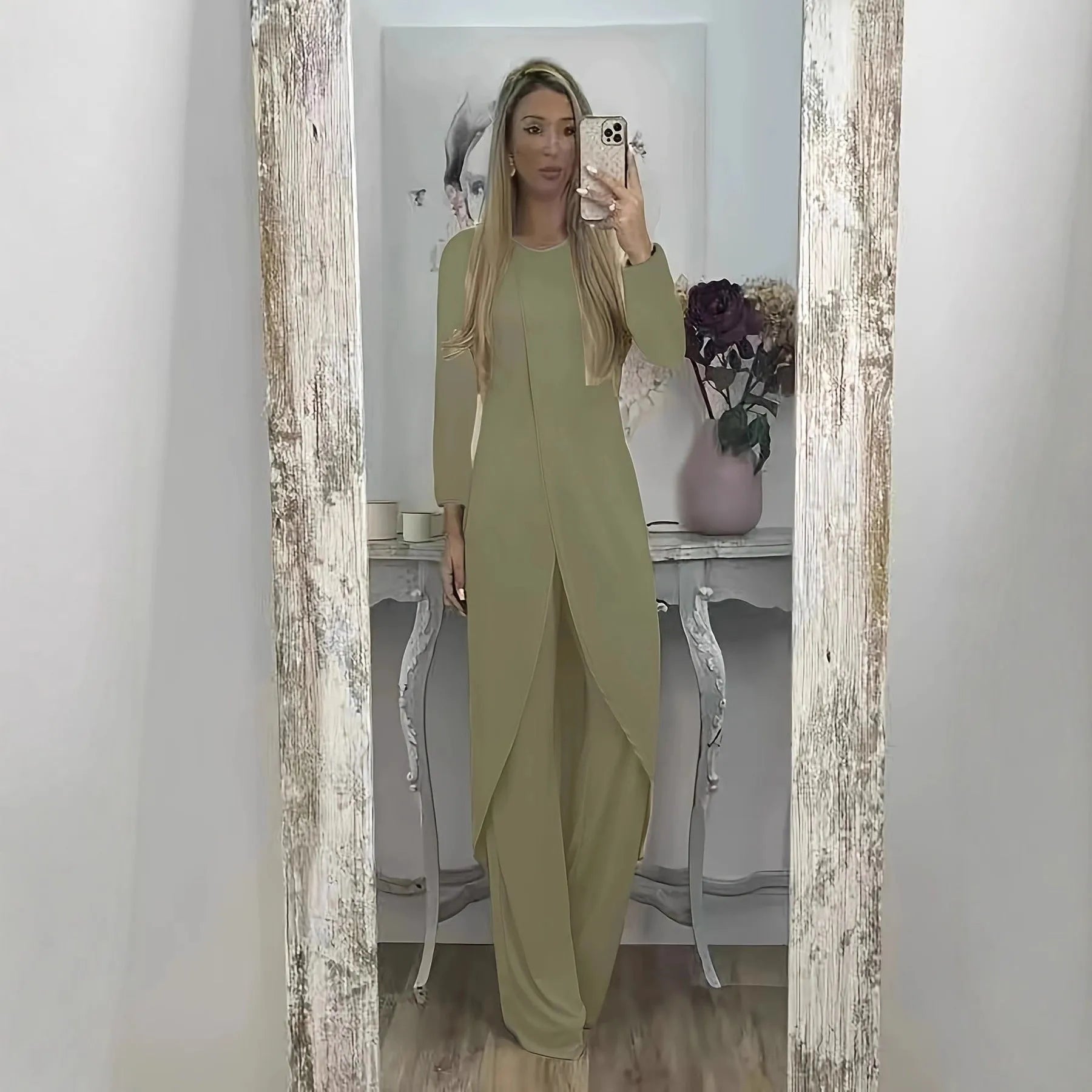 Casual black long sleeve round neck top and loose trousers two-piece lounge wear set.