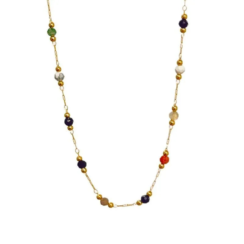 Gold titanium steel necklace with natural stone pendant on female model