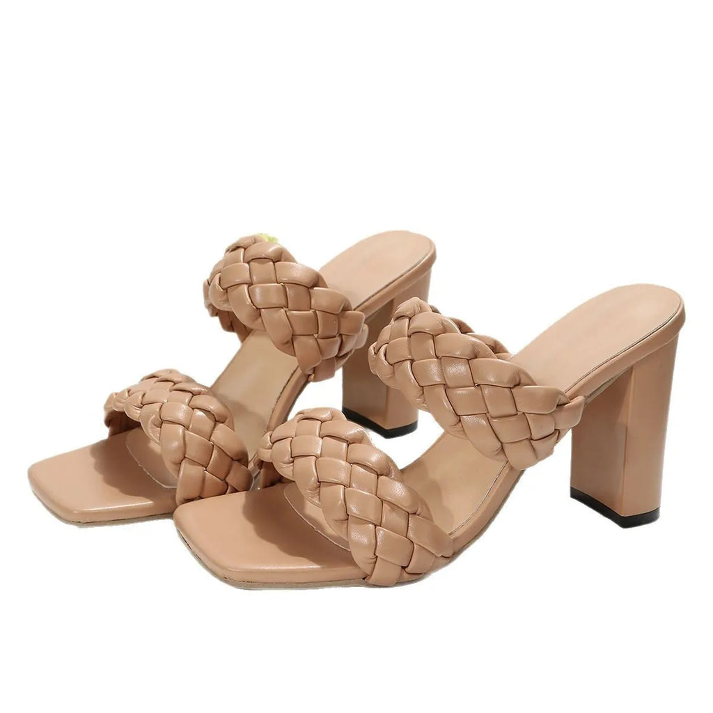 White square toe flip flops with a chunky woven heel and twisted PU strap on a rubber sole.