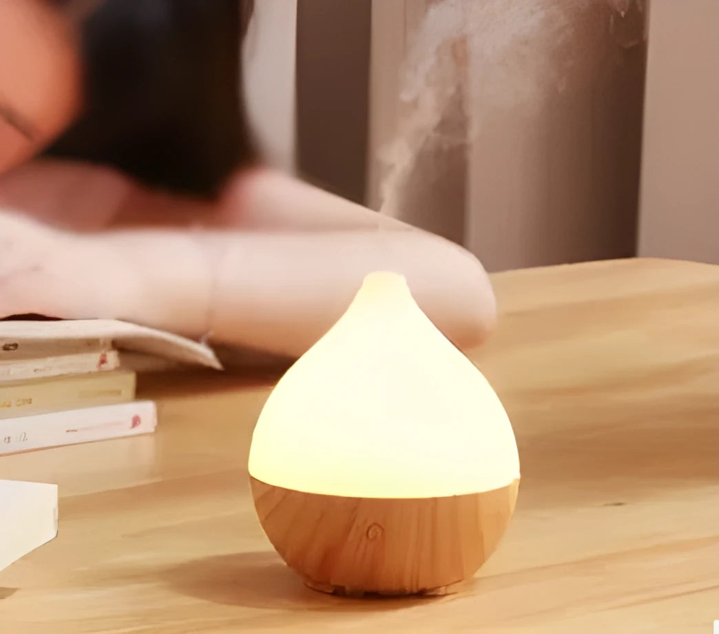 Asakusa wood grain finish vase-shaped ultrasonic aroma diffuser with 100ml water tank capacity.