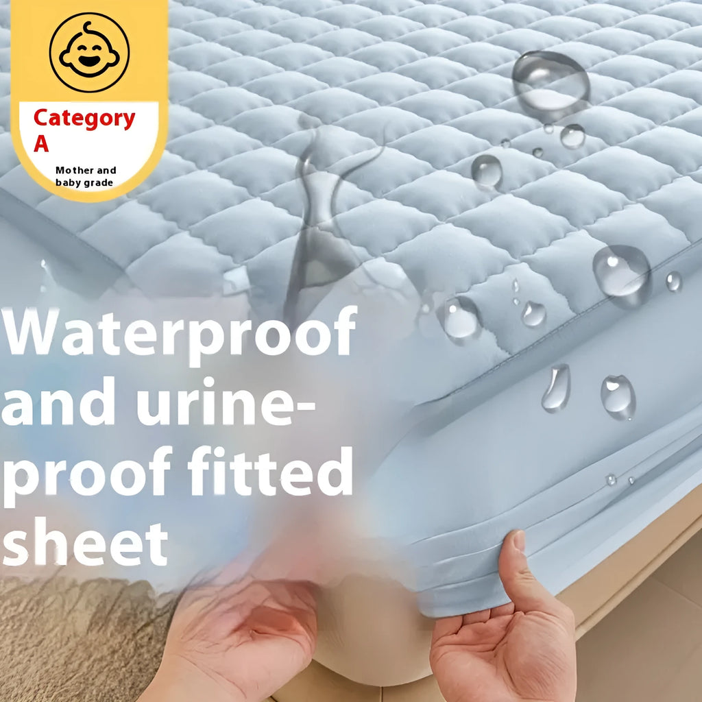 Class A waterproof fitted sheet in light grey colour, shown fitted neatly on a mattress.
