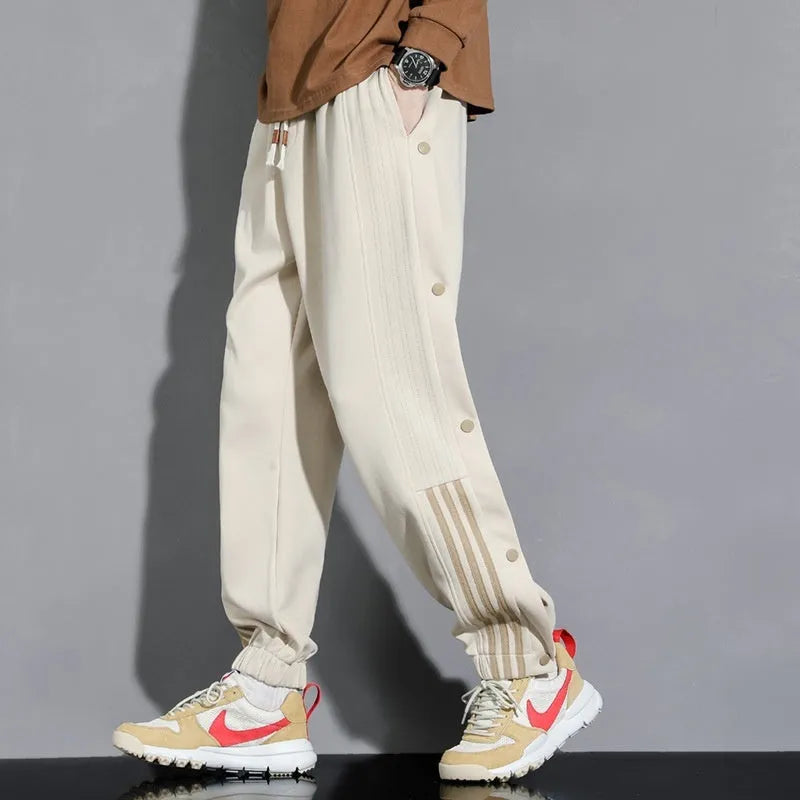 Men's loose-fit sportswear trousers with ankle tie detail in cotton blend fabric