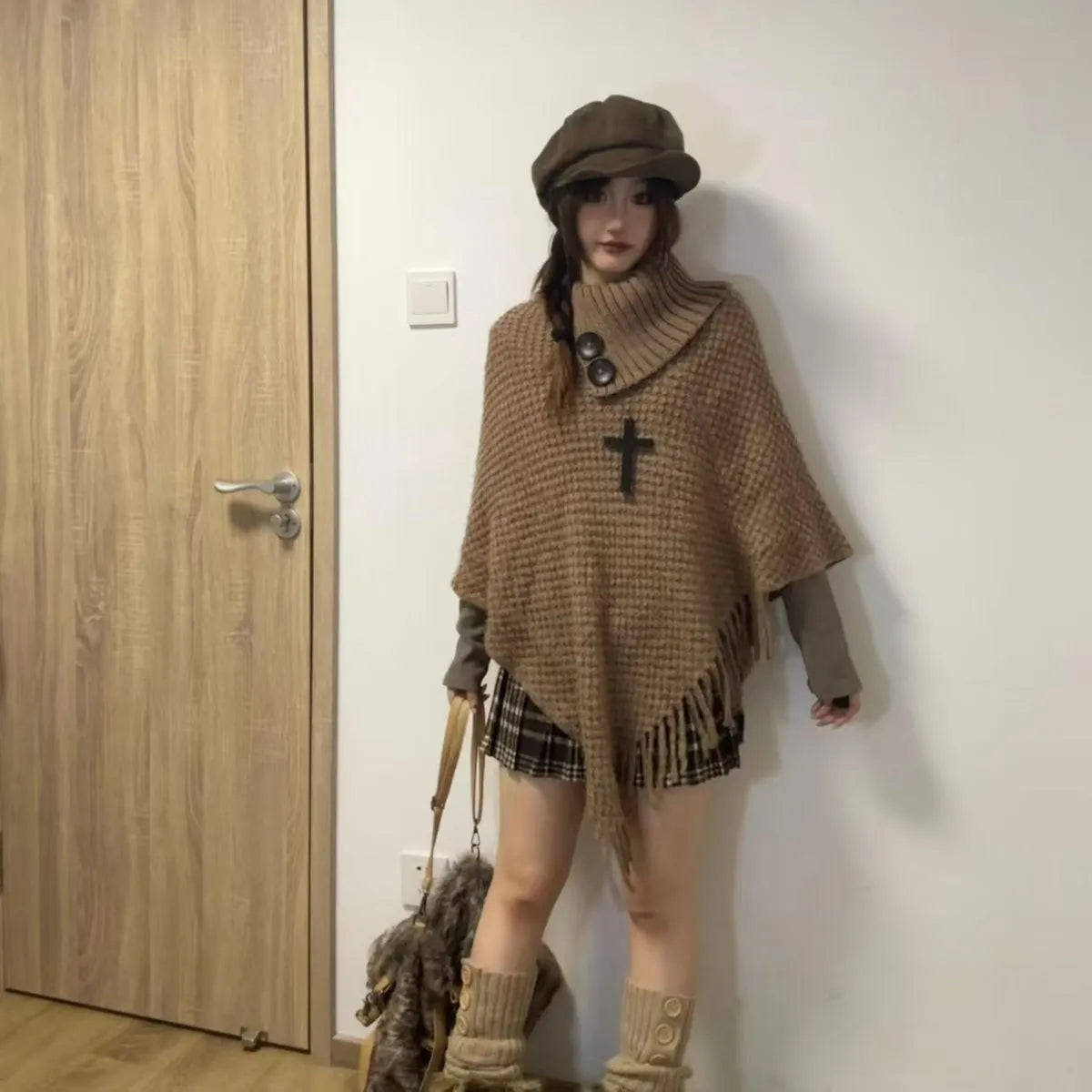 Women's triangle shawl cape in plush cashmere-acrylic blend with tassel detailing