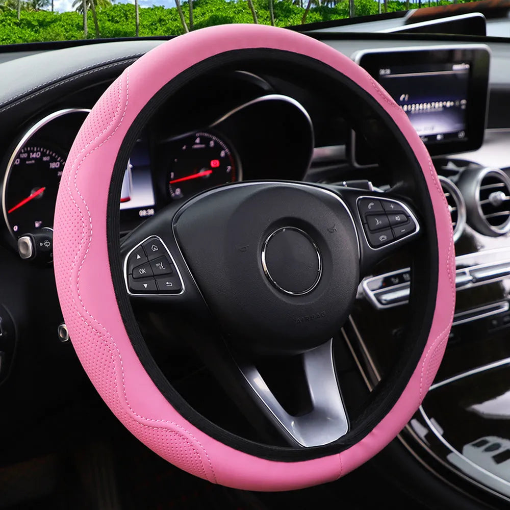 Elastic embossed corrugated PU leather steering wheel cover for 37-38cm diameter wheels in multiple colours.