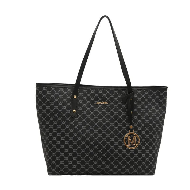 PU leather street trend shoulder bag with sewing thread detail in a choice of colours.